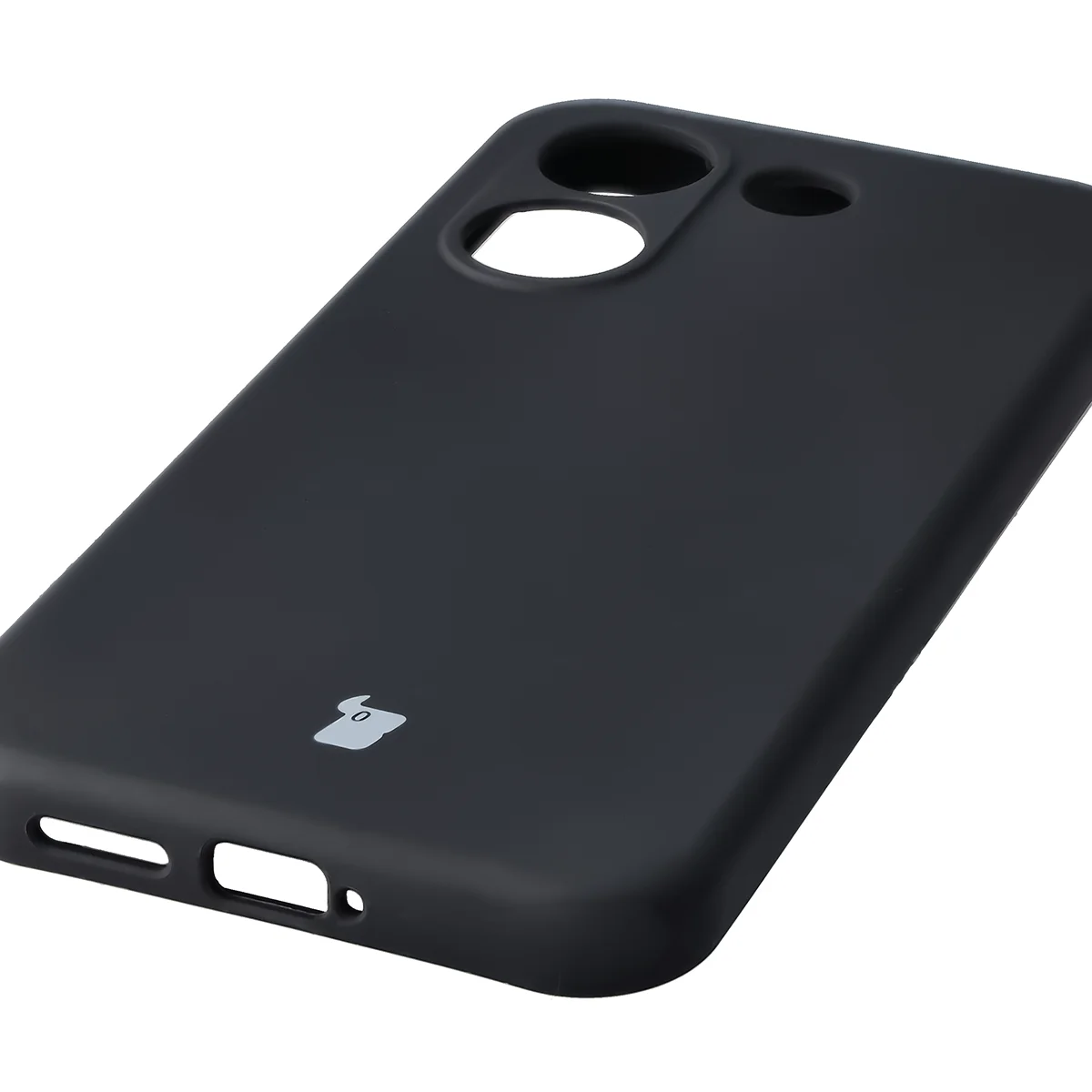Zbliżenie na precyzyjne wycięcia i możliwość ładowania indukcyjnego w etui Bizon Soft Case do Xiaomi POCO X8 Pro
