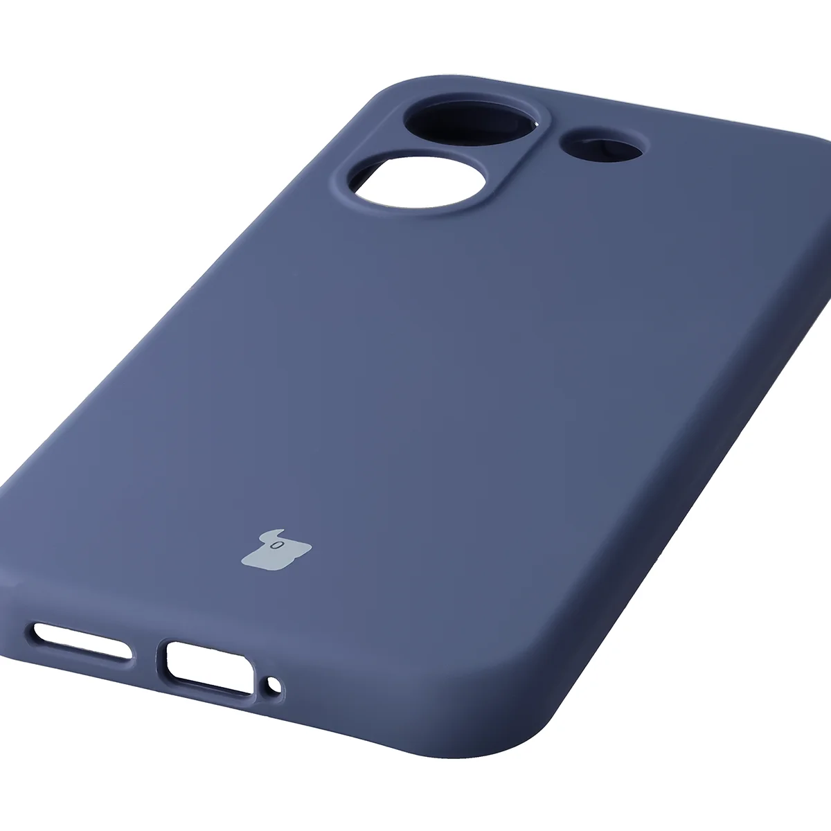Zbliżenie na precyzyjne wycięcia i możliwość ładowania indukcyjnego w etui Bizon Soft Case do Xiaomi POCO X8 Pro
