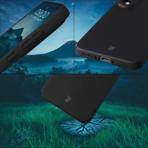 Czarne etui Bizon Case Łupka leżące na stole, obok akcesoriów telefonicznych